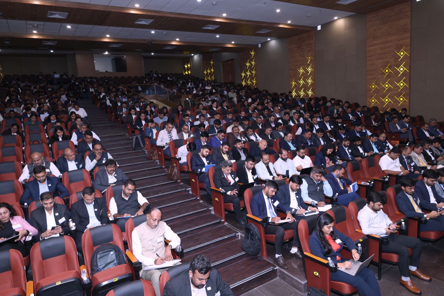Upendrasinh Zala speaking on stage